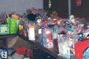 Table full of gift bags ready for recipients